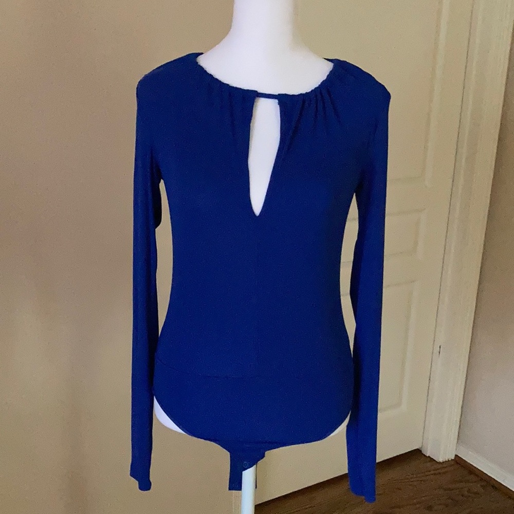 Aritzia bodysuit with long cleavalage